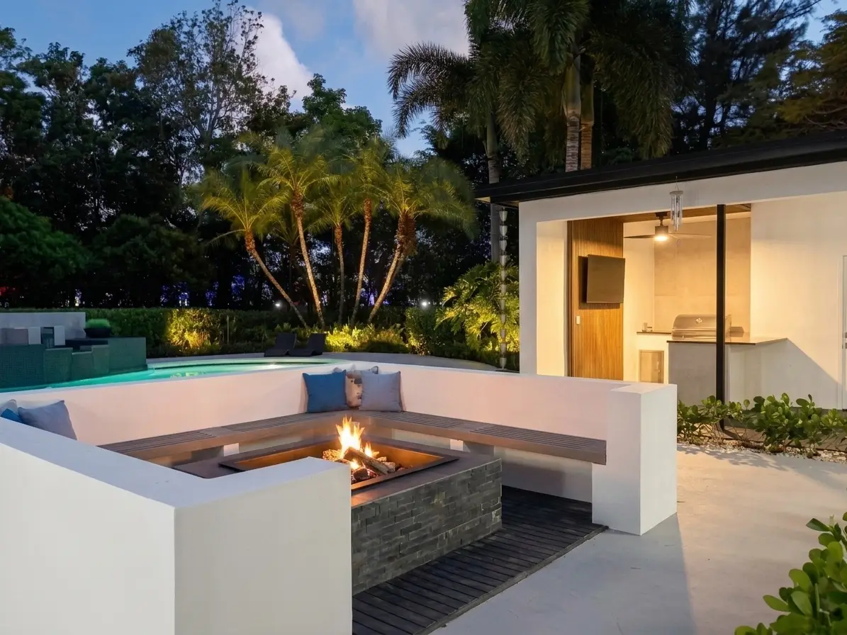 Outdoor kitchen pavilion with grill, counter seating and TV